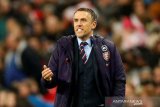 Pep sarankan Phil Neville untuk latih klub