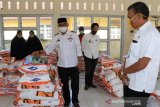 Bupati Lutim pantau pendistribusian benih jagung kepada poktan