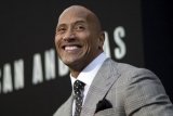 Kisah selebritas Hollywood Dwayne Johnson dari muda penuh warna di 