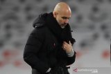 Guardiola sebut tak realistis bicarakan peluang caturgelar Manchester City