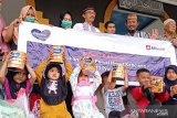 Bebelac dan Alfamidi Berikan 1.000 Parcel Hebat Kebaikan di 13 Provinsi