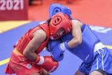 Wushu - Tharisa segel emas sanda52 kg putri usai kalahkan tuan rumah