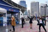 Sydney longgarkan banyak pembatasan COVID-19