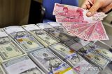 Rupiah menguat seiring pasar nantikan pertemuan The Fed