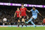 Liga Inggris - Neville dan Keane kecam MU lempar handuk lawan Manchester City