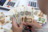 Yuan terdongkrak 60 basis poin terhadap dolar AS