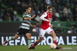 Arsenal bermain imbang 2-2 saat bertandang ke markas Sporting Lisbon