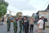 Tiga polisi terkena panah saat amankan bentrokan warga