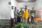 Baznas dan KUA serahkan bantuan kepada korban banjir di Sigi