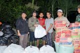 Pj Bupati Teddy Meliwansyah bagikan nasi bungkus untuk warga terdampak banjir