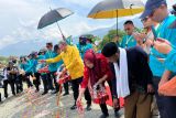 Badan Geologi melakukan tabur bunga di lokasi eks likuefaksi di Palu