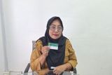 Sriwahyuni puas berobat di Puskesmas Kampung Baru dengan program JKN