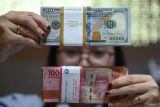 Rupiah menguat setelah pelantikan Presiden