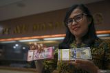 Rupiah merosot jelang Pilpres AS