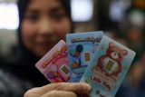 Emas Antam Jumat pagi naik tipis jadi Rp1,470 juta per gram