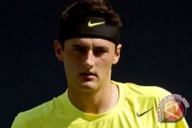 Tomic berjuang keras bertahan di AS terbuka 