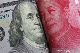 Yuan rebound 179 basis poin menjadi 6,9718 terhadap dolar AS