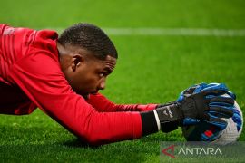 Mike Maignan belum menyerah untuk bela Prancis di Piala Dunia