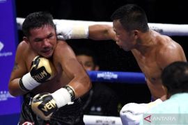 Daud Yordan menang TKO atas petinju Thailand Panya Uthok Page 2 Small