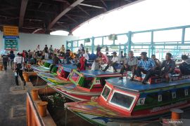 Mudik Jalur Sungai di Palembang Page 1 Small