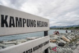 Libur lebaran di Pantai Kampung Nelayan Palu Page 4 Small