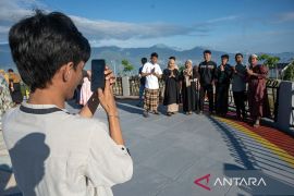 Shalat Idul Adha di Taman Huntap Talise Palu Page 5 Small