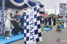 Pawai Ta\'aruf MTQ Inhu dimeriahkan dengan pencak silat
