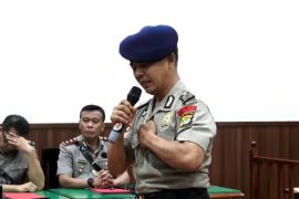 Bripka Rohmad berharap bisa tetap bertugas sebagai polisi
