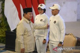 Rizki Juniansyah meraih emas dan pecahkan dua rekor dunia