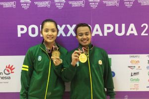 Menang WO, Jatim rebut emas ganda campuran bulu tangkis PON Papua