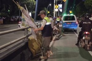 DKI sepekan, program pasar murah hingga penertiban APK partai politik