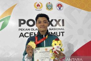 Taekwondo - Adhiyodha mampu sabet emas meski pertama tampil PON XXI
