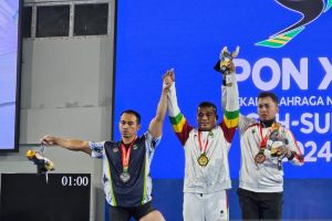 Angkat berat - Emas kelas 74 kilogram putra menjadi milik Hendri