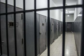 Prison head dismissed over forcing Muslim inmates to eat dog meat