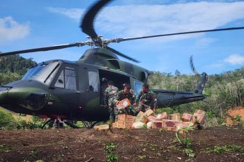 Indonesian military airlifts aid to North Sumatra villages