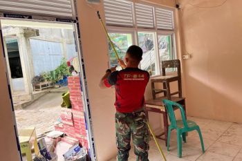 Govt deploys military to speed up school cleanup in West Sumatra