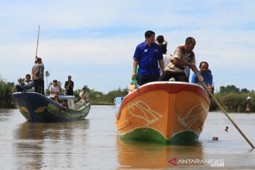 Tinjau Muara Dangkal