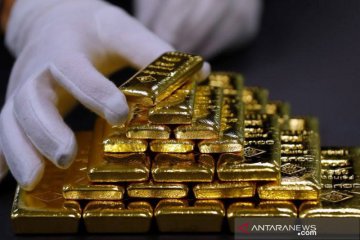 Harga emas berjangka naik tipis, Fed indikasikan akhiri stimulus lebih cepat