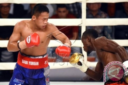 Daud Yordan Pertahankan Gelar WBO Page 1 Small