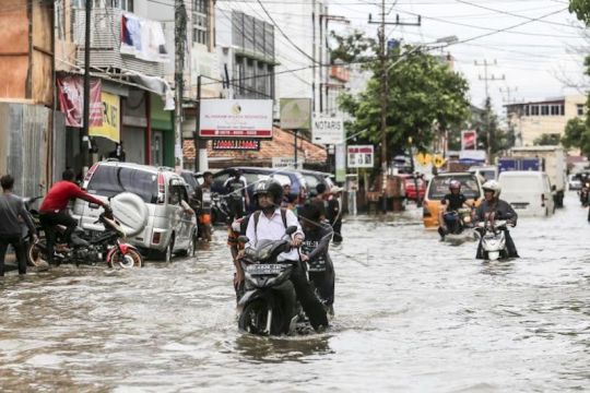 Mengulik persoalan banjir Palembang