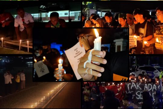 Lilin menyala dan doa dipanjatkan untuk korban tragedi Kanjuruhan