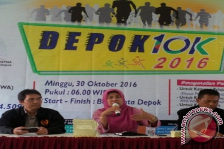 Agus-Triyaningsih Ramaikan Lomba Lari Depok 10 K