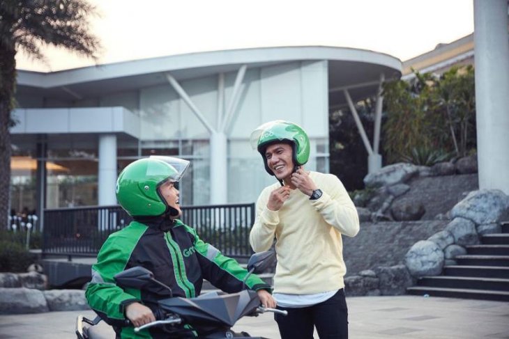 Sistem baru Grab, membatalkan perjalanan kena denda