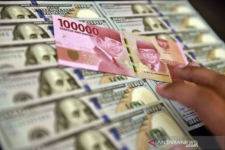Rupiah exchange rate strengthens by four points before year-end