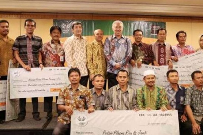 Asian Agri Membagikan Hasil Penjualan Minyak Sawit Berkelanjutan kepada 29.000 Petani