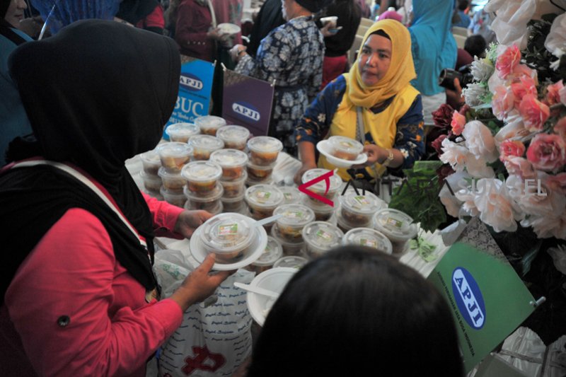 APJI  bagikan 1000 porsi pindang patin