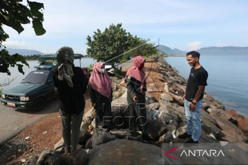 Penegakan Hukum Syariat Islam Di Lokasi Wisata