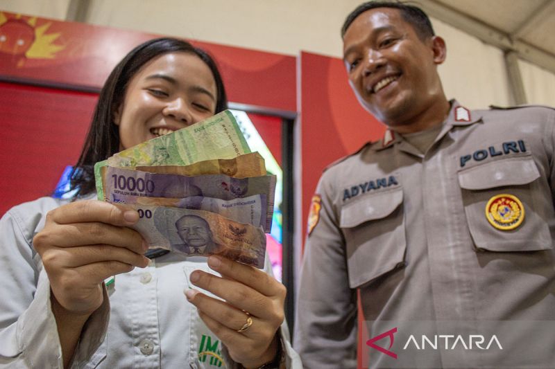 Sosialisasi keaslian uang rupiah di Palu