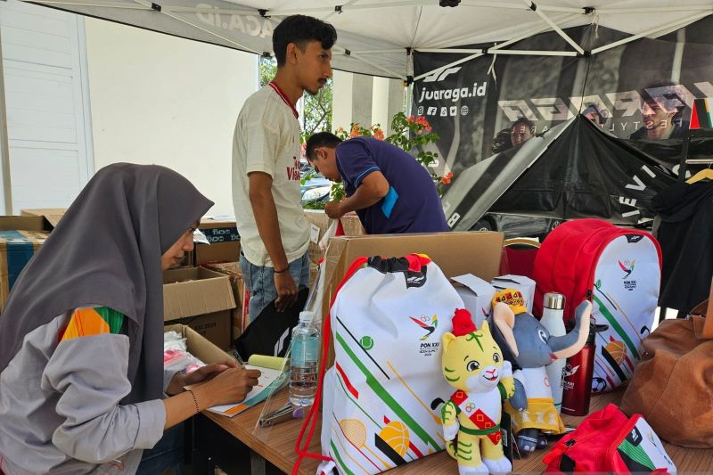 Merchandise resmi, jodoh sah dan pengikat memori pesta olahraga