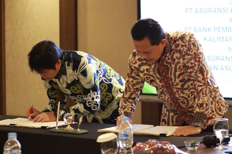 askrindo-teken-kerja-sama-asuransi-umkm-dengan-bpd-kalteng